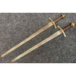 Matching pair of German film prop Swords with double edged fullered blades 800mm in length, blunt