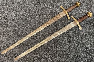 Matching pair of German film prop Swords with double edged fullered blades 800mm in length, blunt