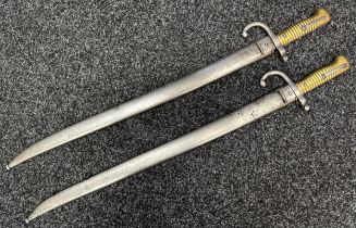 Two French 1866 Pattern Chassepot sword bayonets. Both German made and maker marked for "Alexander