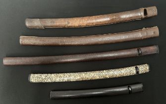 A collection of three Japanese Sword Saya Scabbards including one with Ray Skin wrap, along with two