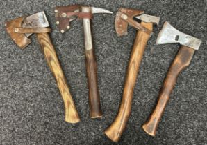 A collection of four hand Axes. Three with leather blade guards. One Fire Brigade style axe