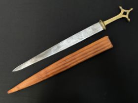 Dagger with double edged blade with punch mark decoration, 364mm in length. Cast brass grip. Overall