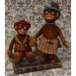 A pair of 1930's Dean's Rag Book Co. Eb and Flo velvet dolls, each with pressed moulded faces with