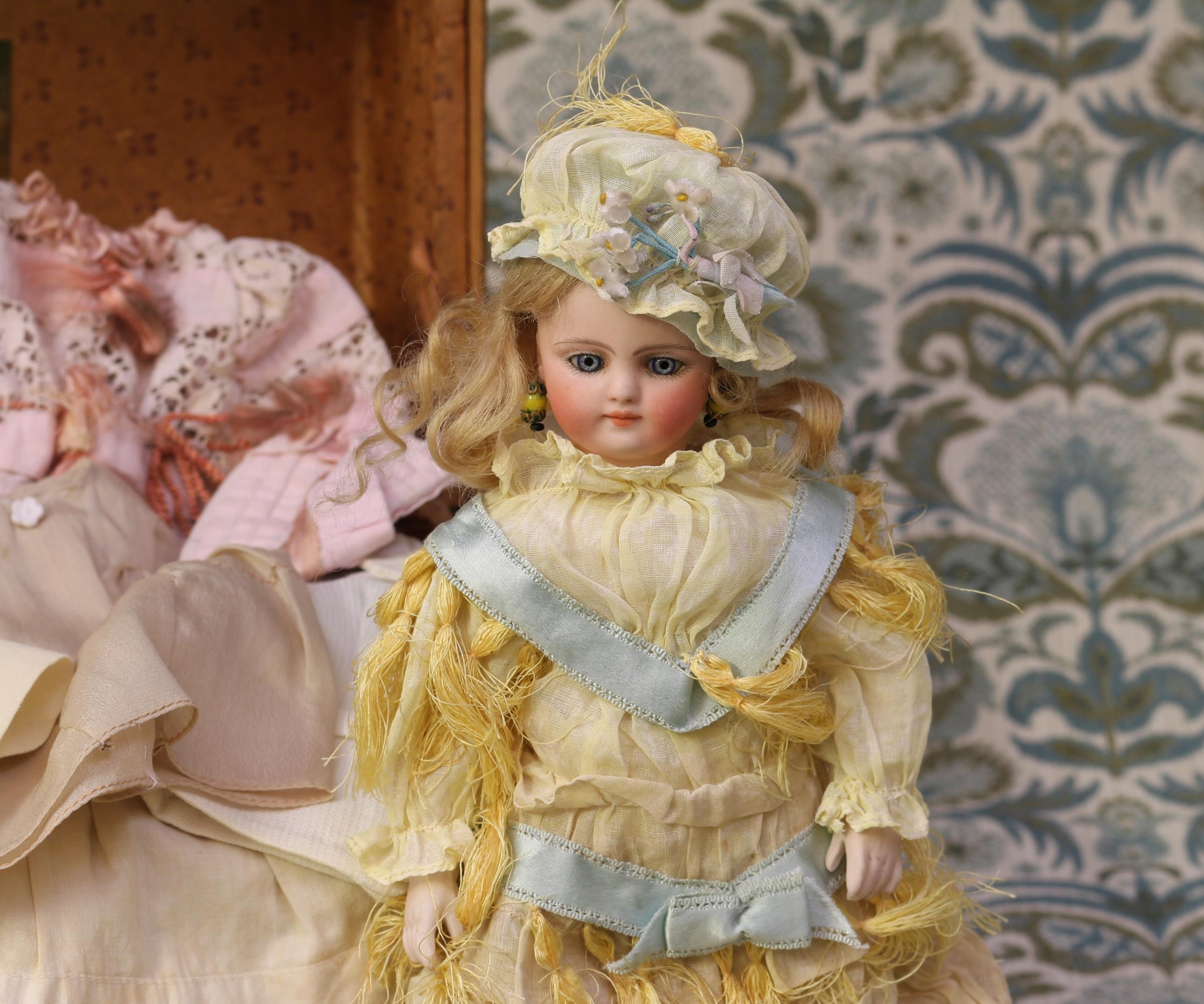 A late 19th century bisque shoulder and bisque head doll, of small proportions, the bisque head - Image 2 of 3