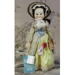 A Cameo Queen Creations (USA) reproduction 'Queen Anne' style carved and painted wooden doll,