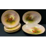 A pair of Crown Devon oval shaped bowls, painted with Pheasants, signed J.Coleman; six plates (