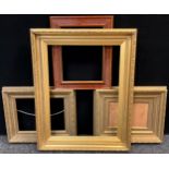 A Victorian ornate gilt frame, 81cm x 65cm; a pair of smaller 19th century gilt frames, 42cm x 51cm;