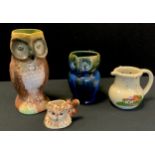 Bourne Denby Electric blue over green trailing glaze owl jug, 15cm high; John Beswick, Beatrix