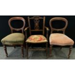 A pair of Victorian mahogany hoop-back chairs, sprung seats, turned legs, c.1880; an Edwardian