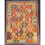 A Turkish Anatolian Kilim, with geometrical design in bright tones of red, blue, turquoise, green,