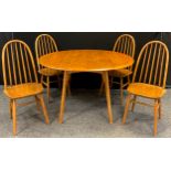 Ercol - A mid 20th century Elm and Beech dining table and four chairs - Modern design drop leaf