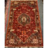 A South-West Persian Qashgai rug / carpet, hand-knotted with a hexagonal medallion with an intricate