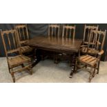 An Ercol dining table and set of six chairs - 434 model draw-leaf extending elm dining table, 74.5cm