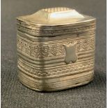 A 19th century Dutch silver coloured metal rounded rectangular spice box, decorated with bands of