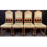 A set of four early 20th century oak dining chairs, 108cm high, (4).