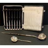 A Victorian silver spoon, pierced bowl back, London 1883; cased set six silver hafted kings