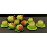 A Carlton ware novelty apple shaped tea service for four comprised of two tea pots, four tea cups/