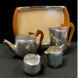 A five piece Picquot Ware tea service, comprising teapot, hot water hot, covered sucrier, milk jug