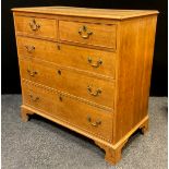A 19th century oak chest of drawers, two short over three long graduated drawers, bracket feet,
