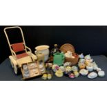 A 1950's Sunspring dolls pushchair; a collection of childs doll miniature part tea sets, mostly