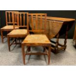 A 19th century gate-leg kitchen / dining table, and set of three country Lathe back kitchen