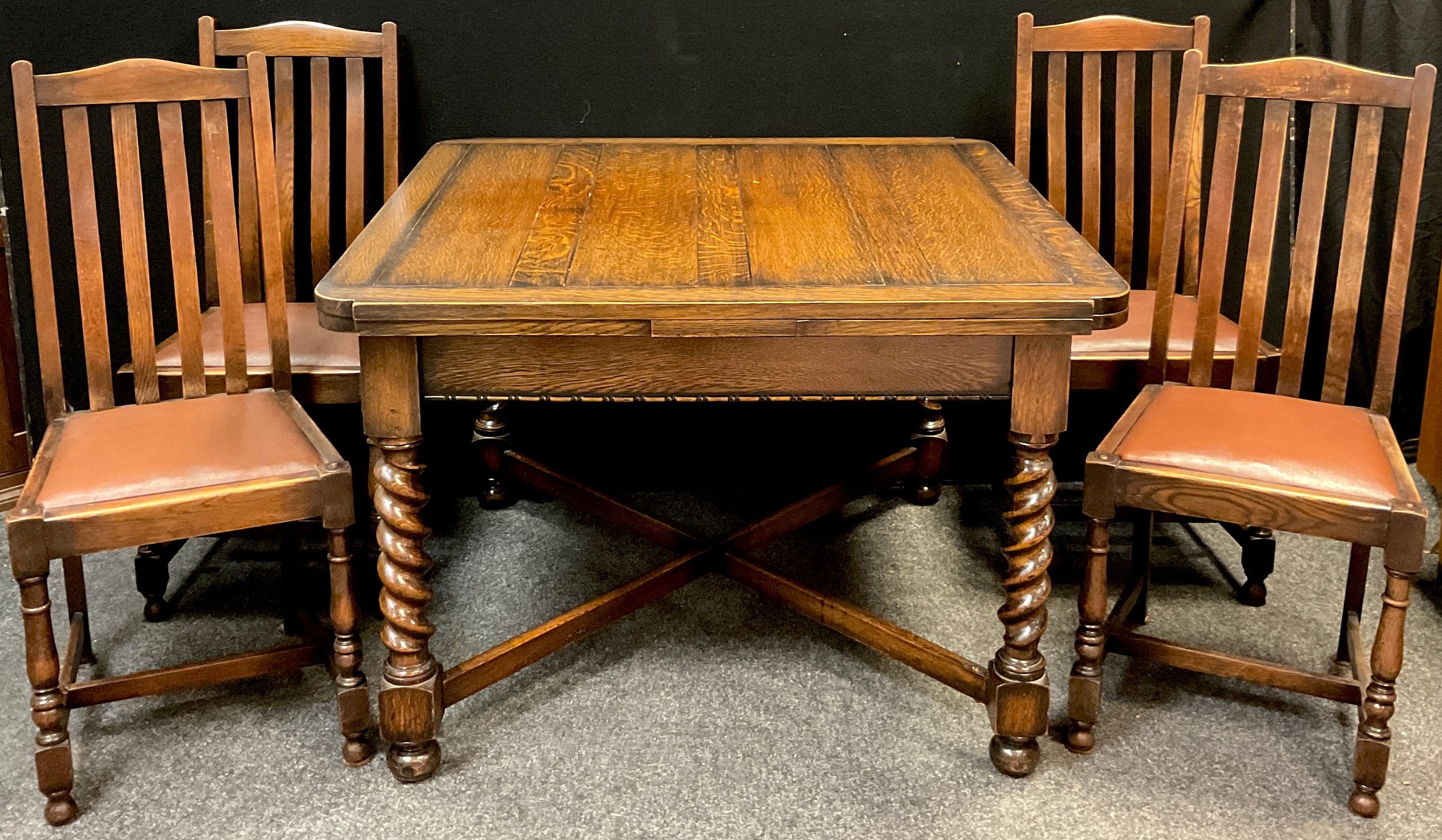 A mid 20th century oak draw-leaf dining table, by ‘Majority furniture’, 1930-1950, barley-twist