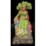 A Staffordshire Pearlware figure, Ralph Wood, widow of Zarepeth with oil and barrel, 25.5cm high,