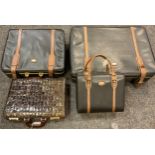 A Pierre Cardin three piece luggage set; a patent mock crock brown leather briefcase (4)