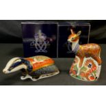 A Royal Crown Derby paperweight, Fawn, Collectors Guild exclusive, gold stopper; another Moonlight