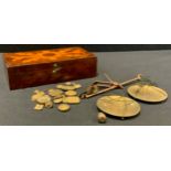 A set of 19th century gold balance scales, assorted weights, walnut and marquetry box