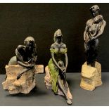 A moulded resin figure group, The Lovers, 43cm; two similar, female figures (3)