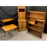 A mid 20th century three tier small oak bookcase, 81cm high x 72cm wide; an oak side cabinet; oak