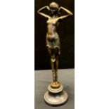 Demétre Chiparus (Romanian, 1886-1947) after , a bronze figure of an exotic dancer with her arms