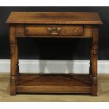 A Titchmarsh & Goodwin style oak side table, 61cm high, 76cm wide, 45cm deep