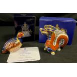 A Royal Crown Derby limited edition Paperweight Partridge, 842/4500, gold stopper; another Dragon,
