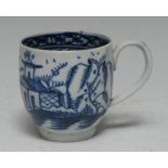 A Liverpool Pearlware bell-shaped coffee cup, painted in underglaze blue with a Chinoiserie