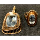 A continental 9ct/yellow metal and blue stone pendant and ring, probably topaz, mount and shank,