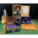 A set of jewellers balance scales, cased; similar weights; Metronomex Maelzel metronome; Fuji