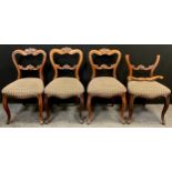 A set of four early Victorian rosewood dining chairs, 81cm high, (4).