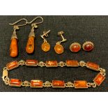 A pair of amber cabochon drop earrings, 9ct gold mounts, 2.2g gross; silver tubular drop earrings;