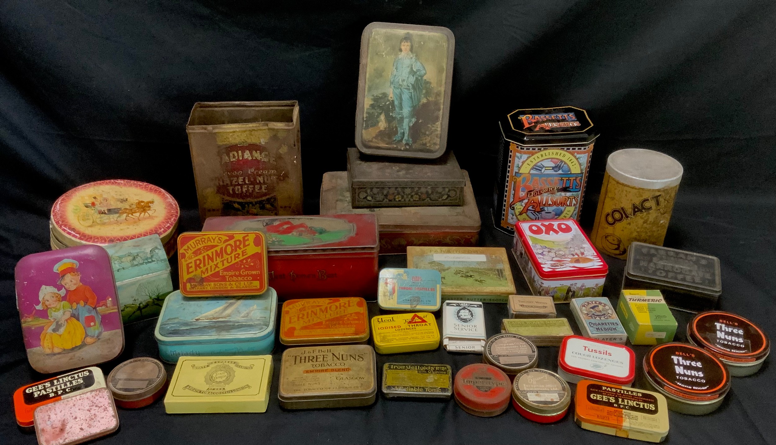 Boxes and objects - an early/ mid century ebony and boxwood chess set ; a quantity of vintage tins