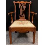 A 19th century Chippendale revival mahogany armchair, pierced and carved splat, serpentine arms with