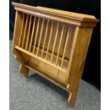 A Victorian pine wall mountable plate rack, 80cm high x 71.5cm wide x 28cm deep.