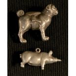 A novelty silver pin cushion as a Pug Dog, Birmingham 1909, ; a Pig pencil, unmarked (2)