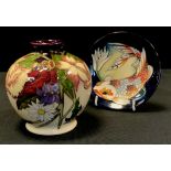 A Moorcroft pottery Ophelia's Flowers pattern globular vase , 11cm high, dater 2009; a Koi Carp