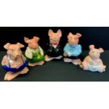 A Family of five Wade Nat West pig money banks, each with original stopper