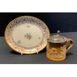 A Pinxton porcelain oval teapot stand, pattern number 339, painted and gilded floral motifs, in