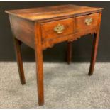 A George III small oak lowboy / hall table, over-sailing rectangular top, pair of short drawers to