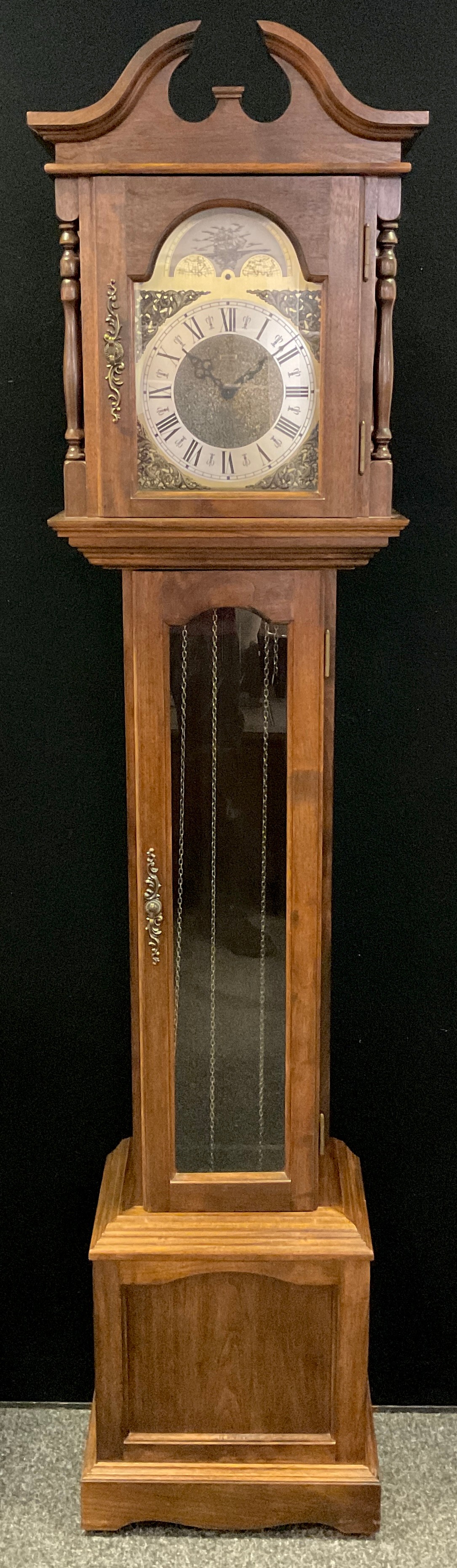 A Long case clock, by Emperor Clock Company, Germany, walnut stained hardwood case, swan-neck