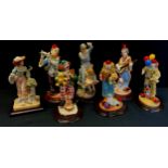 A set of five Regency Fine Arts figures, Clowns; others ladies (7)